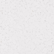 Textured white surface with small flecks