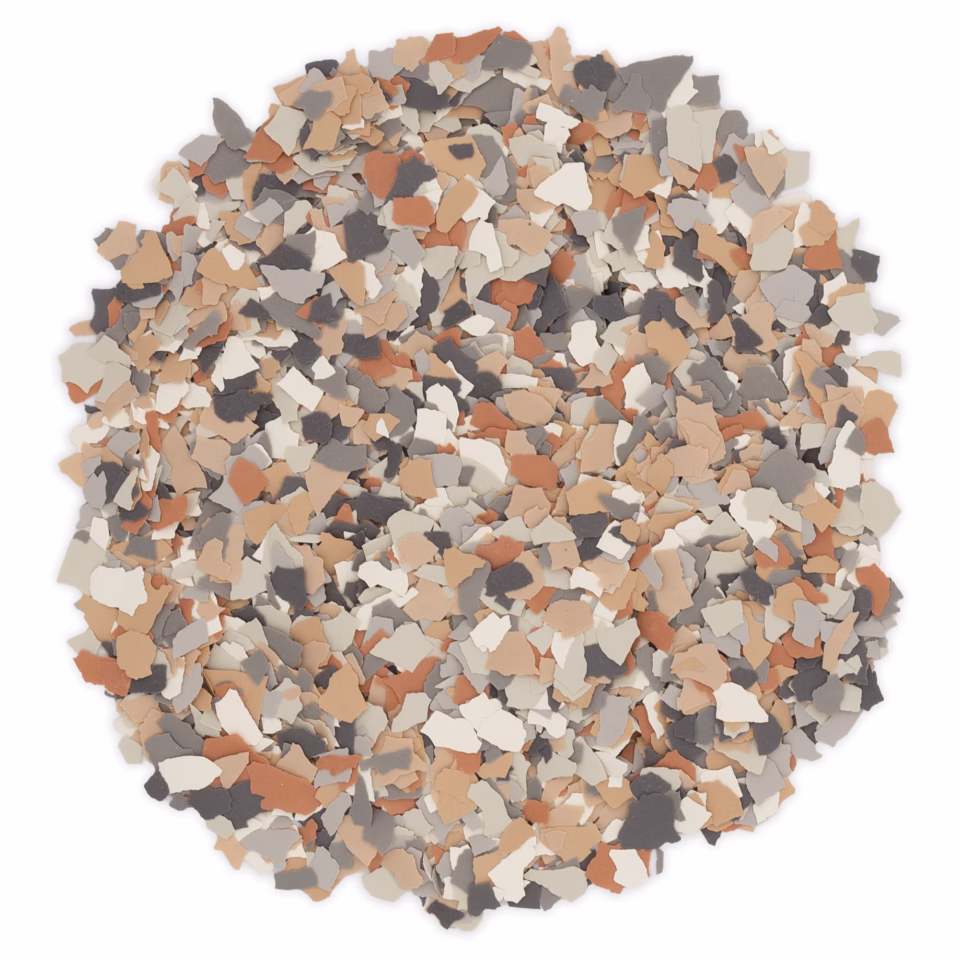 Colorful scattered paint chip fragments